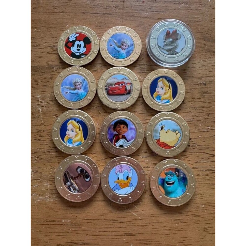 Character coins from the Disney 100th Anniversary Wonder Ball series.set of 12